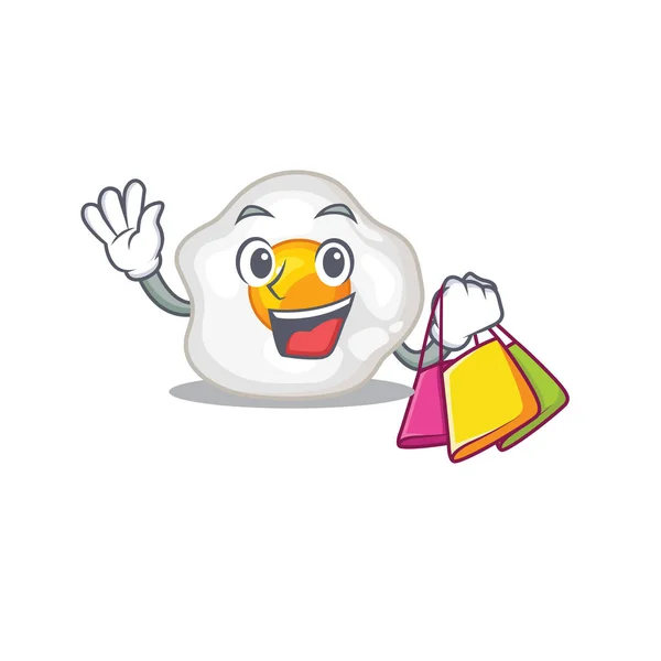 Un rico huevo frito amistoso agitando y sosteniendo la bolsa de compras — Vector de stock