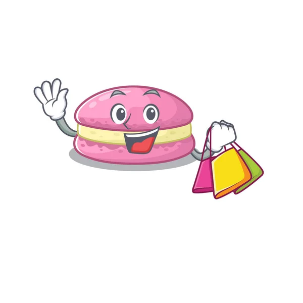 A friendly rich strawberry macarons waving and holding Shopping bag — ストックベクタ