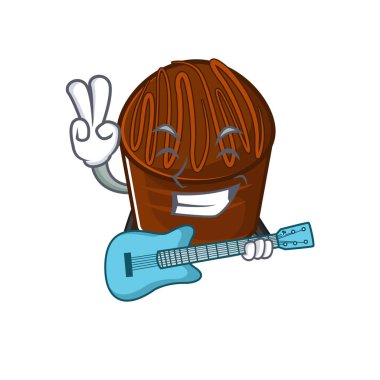 Çikolatalı şekerin gitar çalarkenki resmi.