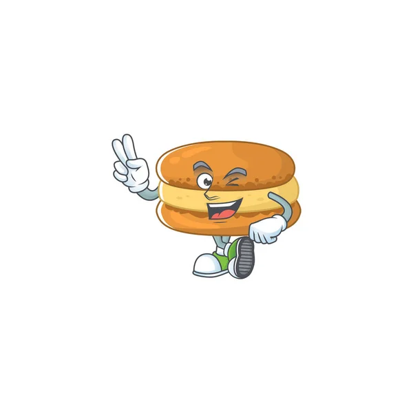 Um alegre design de mascote de macarons de chocolate mostrando seus dois dedos — Vetor de Stock