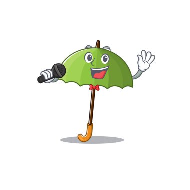 Şirin yeşil şemsiye mikrofonlu bir şarkı söylüyor.