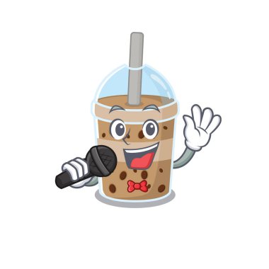 Şirin çikolata köpüklü çay mikrofonla şarkı söyler