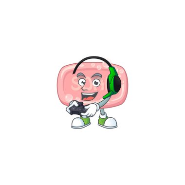 Kulaklık ve kumandayla oynayan pembe sabun oyuncusunun çizgi film dizaynı. Vektör illüstrasyonu