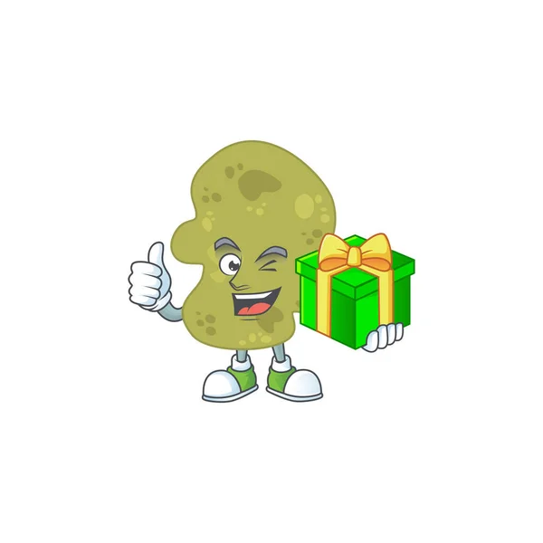 Feliz sonrisa verrucomicrobia diseño de la mascota de dibujos animados con una caja de regalo — Vector de stock