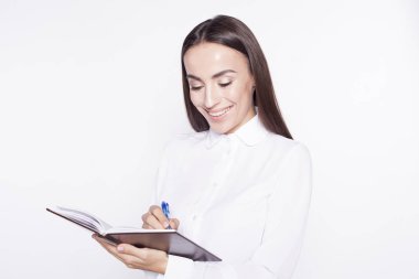 iş kadını bir defter ve kalem el ile.