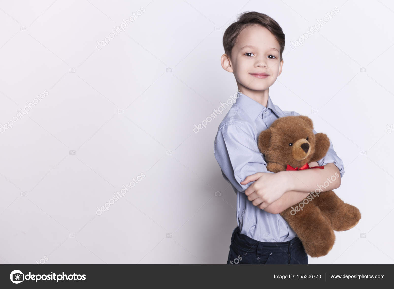 holding a teddy bear