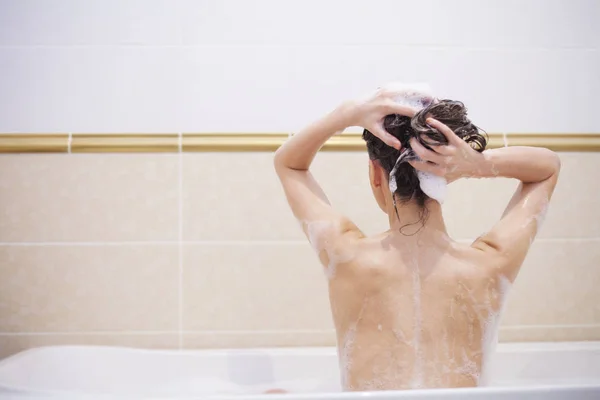 Woman taking bath — Stock Photo, Image