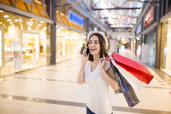 Woman with talking on the phone — Stock Photo, Image