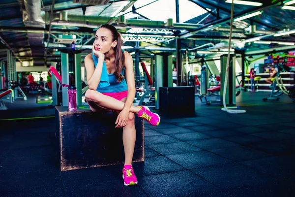 Woman with water after training — Stock Photo, Image