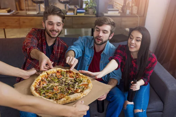 people eating pizza