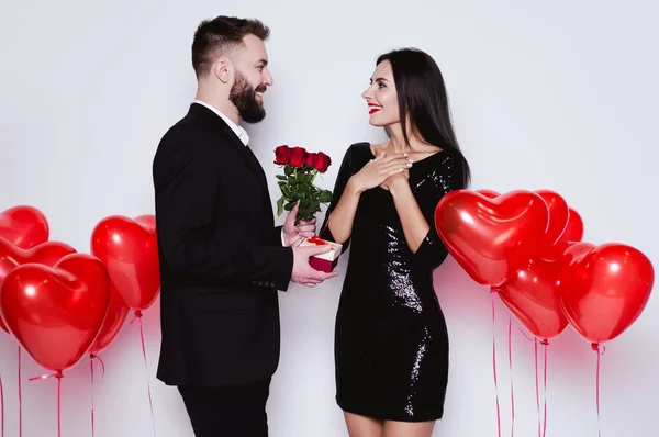 Congratulate You Holiday Lovers Smiling Man Giving Flowers Gift His — Stock Photo, Image