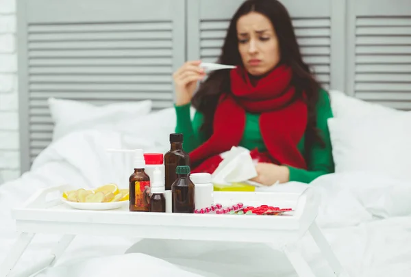 Portrait Young Sick Woman Red Scarf Measures Temperature Thermometer Bed — Stock Photo, Image