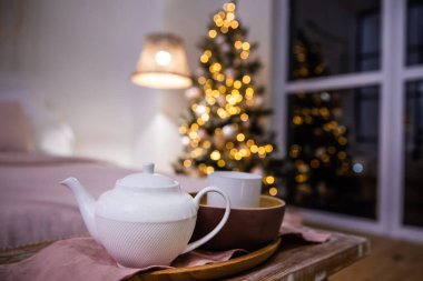 pot and cup in bedroom on Christmas