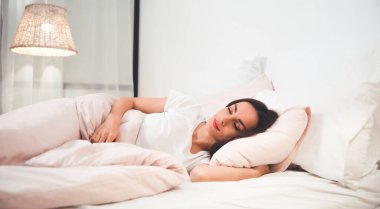 young beautiful woman in bedroom   sleeping 