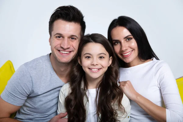 Portrait Happy Young Family Sitting Yellow Sofa — Stock Photo, Image