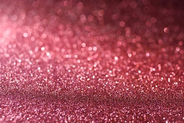 abstract wallpaper with red glitter texture and sparkles