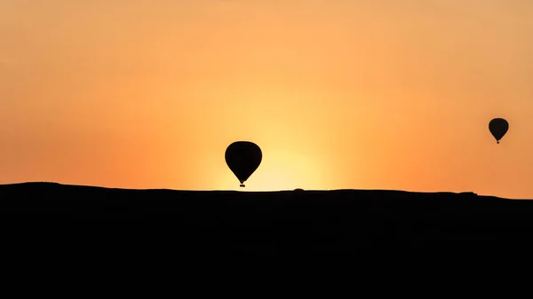 Silhouettes of hot air balloons in Cappadocia, Turkey — Stock Photo, Image