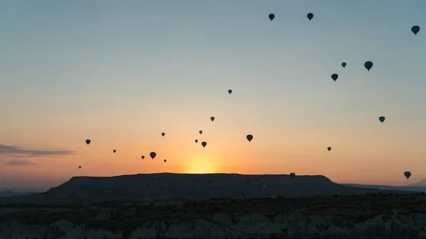 Silhouettes of hot air balloons in Cappadocia, Turkey — Stock Photo, Image