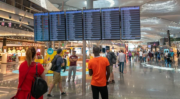Flight information display in new Istanbul Airport displaying the upcoming flights, Istanbul, Turkey — Stock Photo, Image