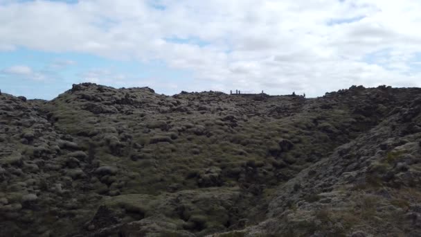 Unidentified Tourists Examining Moss Covered Lava Fields Also Known Green — ストック動画