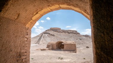 Yazd, Iran - May 2019: Ruins of Zoroastrians Dakhmeh Towers of Silence in Yazd city clipart