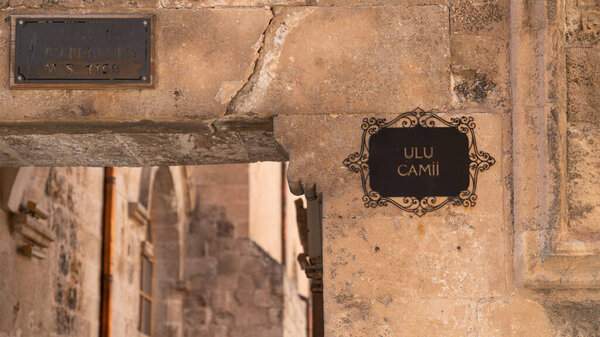 Mardin, Turkey - January 2020: Wall signage for Ulu Cami, also known as Great mosque of Mardin