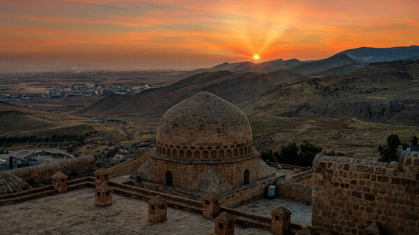 Mardin, Turkey - January 2020: Old Mardin cityscape during sunset