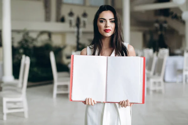 Business woman with folder restaurant menu. — Stock Photo, Image