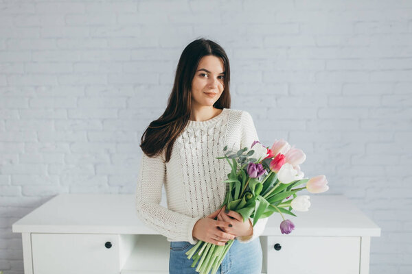 woman with flowers on Mothers Day