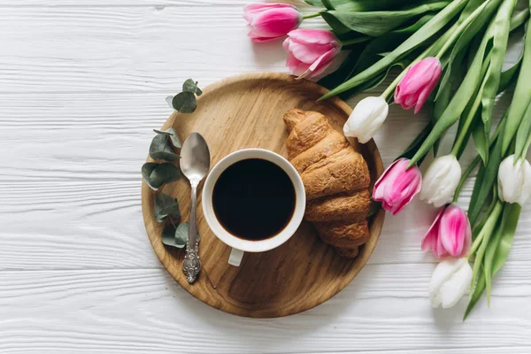 tulips with hot coffee