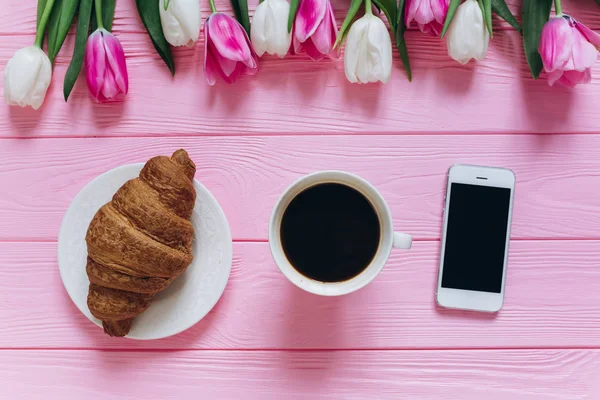 tulips with coffee and phone