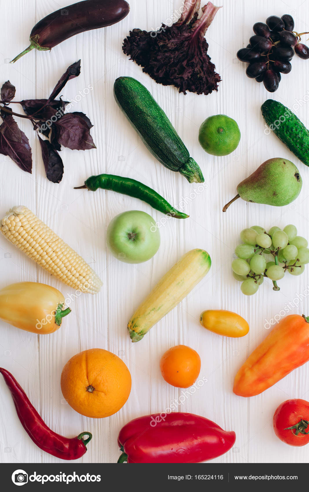 Rainbow colored fruits and vegetables Stock Photo by ©anatoliycherkas