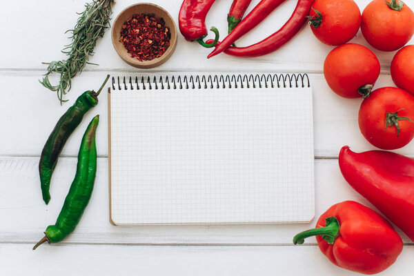 Notebook with vegetables and spices