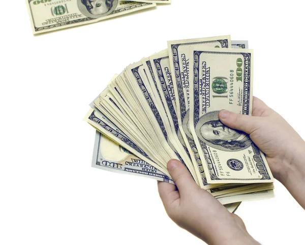 100 dollarsedler i hender på hvit, isolert bakgrunn – stockfoto
