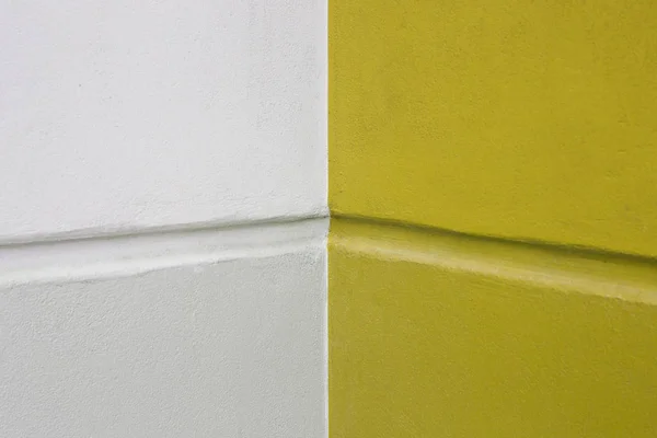 Amarillo y blanco pintado sobre cemento — Foto de Stock