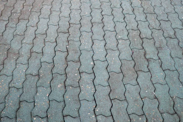 Brick paving stones on a sidewalk background texture — Stock Photo, Image