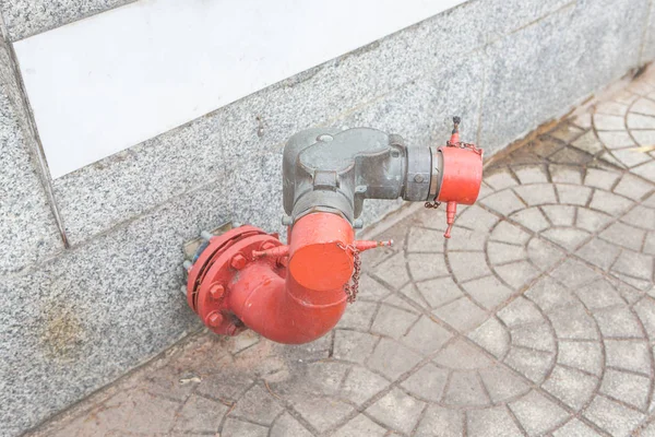 Fire hydrant on sidewalk — Stock Photo, Image