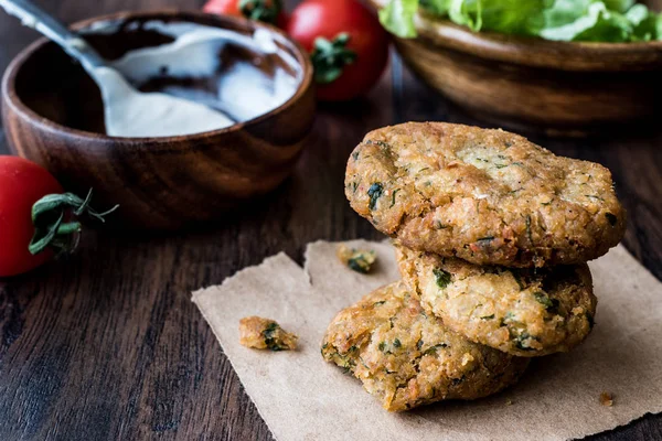 Chickpeas Falafel with sauce , cherry tomatoes and parsley. — Stock Photo, Image