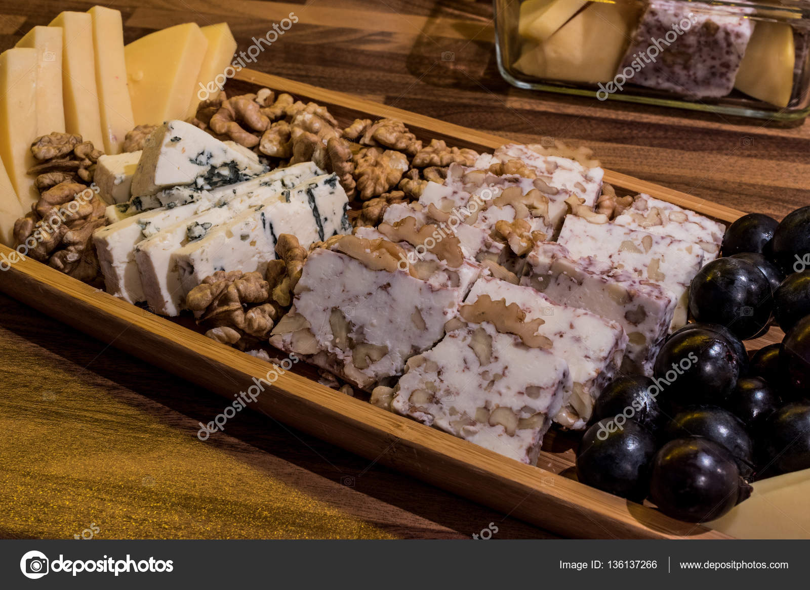 Cheese plate Emmental, Camembert cheese, blue cheese, cheddar, grape