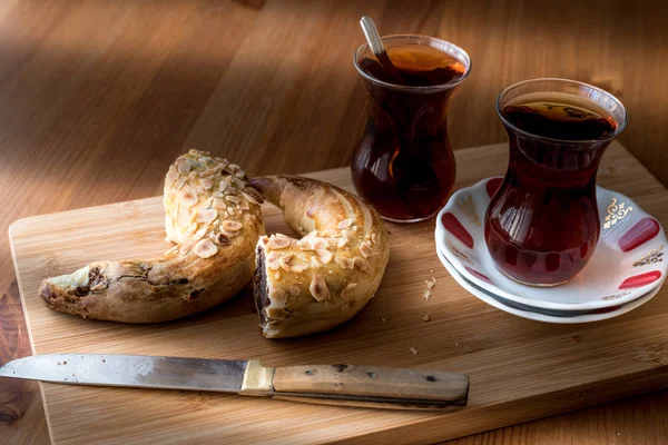 Turkish Ay coregi and tea / Croissant with chocolate cocoa and raisin. — Stock Photo, Image