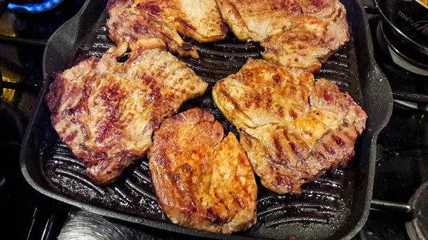 Fried Beef Steak in frying pan — Stock Photo, Image