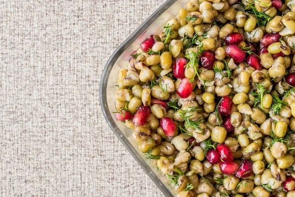 stock image Mung Bean Salad with pomegranate. copy space