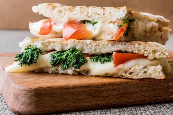 Turkish Bazlama Tost / Toast sandwich with melted cheese, tomatoes and dill