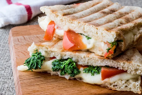 Turkish Bazlama Tost / Toast sandwich with melted cheese, tomatoes and dill