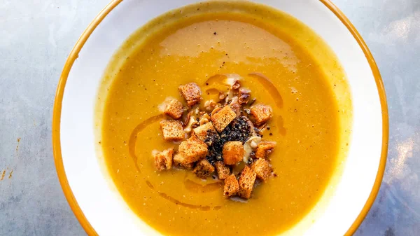 Lentil or Pumpkin Soup with croutons. — Stock Image Lentil or Pumpkin Soup with croutons. Royalty Free Stock Images