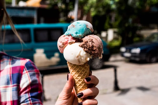 Girl Holding ice cream in the cone — Stock Photo, Image