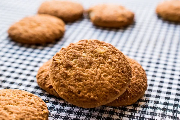 Anzac Biscuits on tablecloth. — Stock Photo, Image