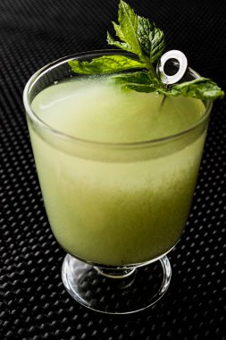 Grasshopper cocktail with mint leaves. clipart