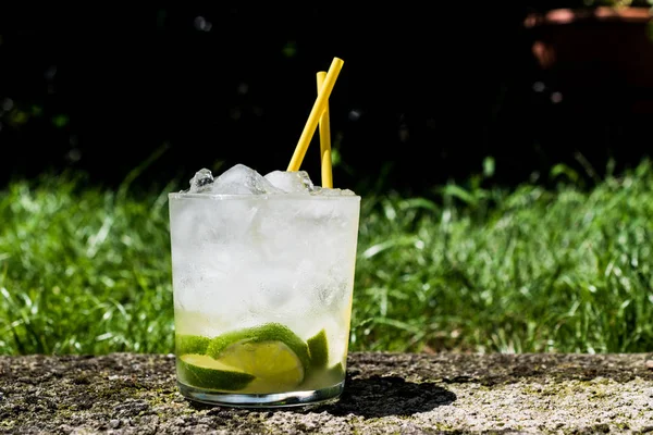 Caipirinha Cocktail with lime and ice. — Stock Photo, Image