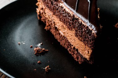 Şeytanlar kek çikolata siyah plaka ile.